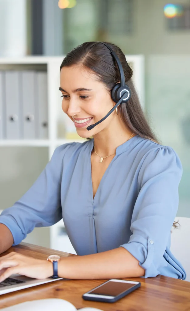 telemarketing call center and woman typing on lap 2