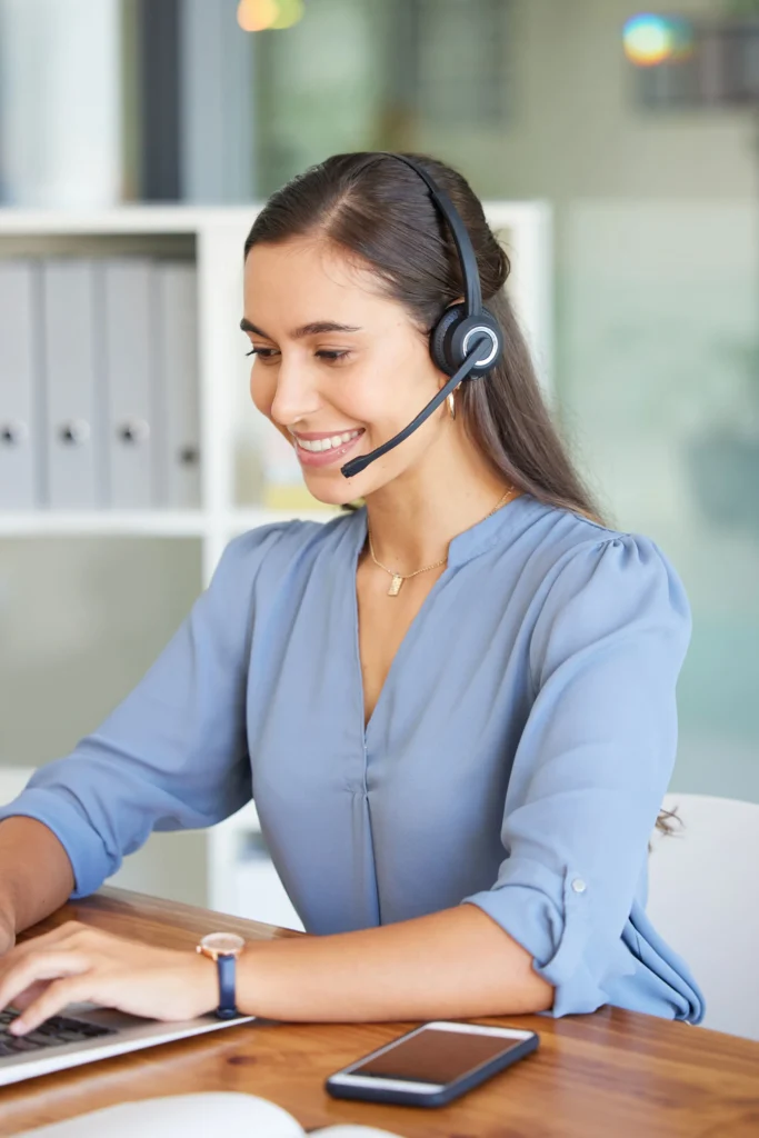 telemarketing call center and woman typing on lap 2